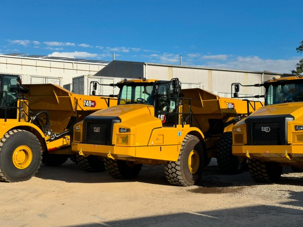 Some dump trucks